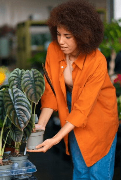 Medium shot woman with beautiful flowers