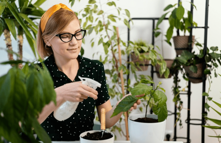 Medium shot woman holding water bottle