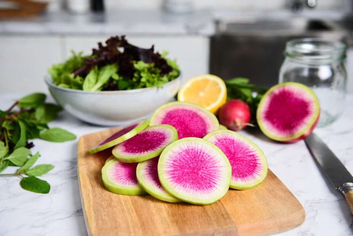 Fresh sliced watermelon radish ready for salads and recipes